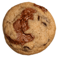 A Chocolate Chunk cookie seen from above, its melted chocolate pooled across a golden crumb.